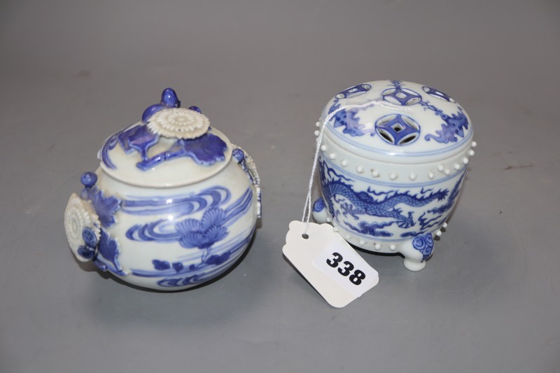 Two Chinese blue and white dragon jars and covers